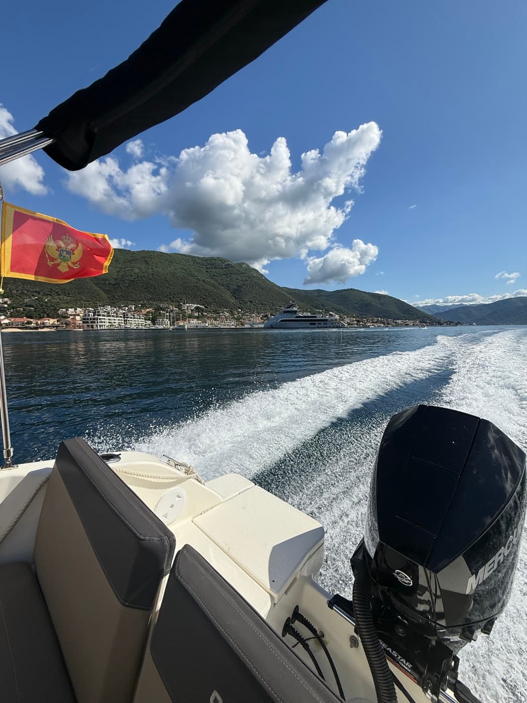 Boat speeding with Montenegro flag