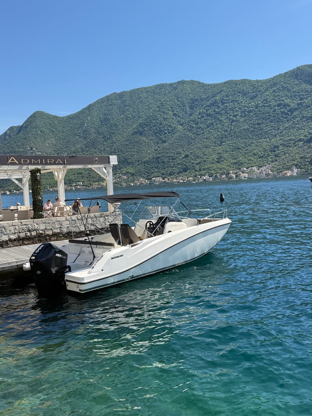 Speedboat docked on a sunny day